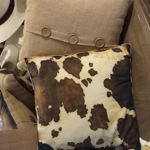 Matching cow print pillows